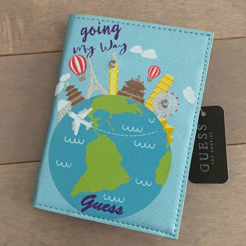 Guess Passport Case. Brand new! Tags still attached.
